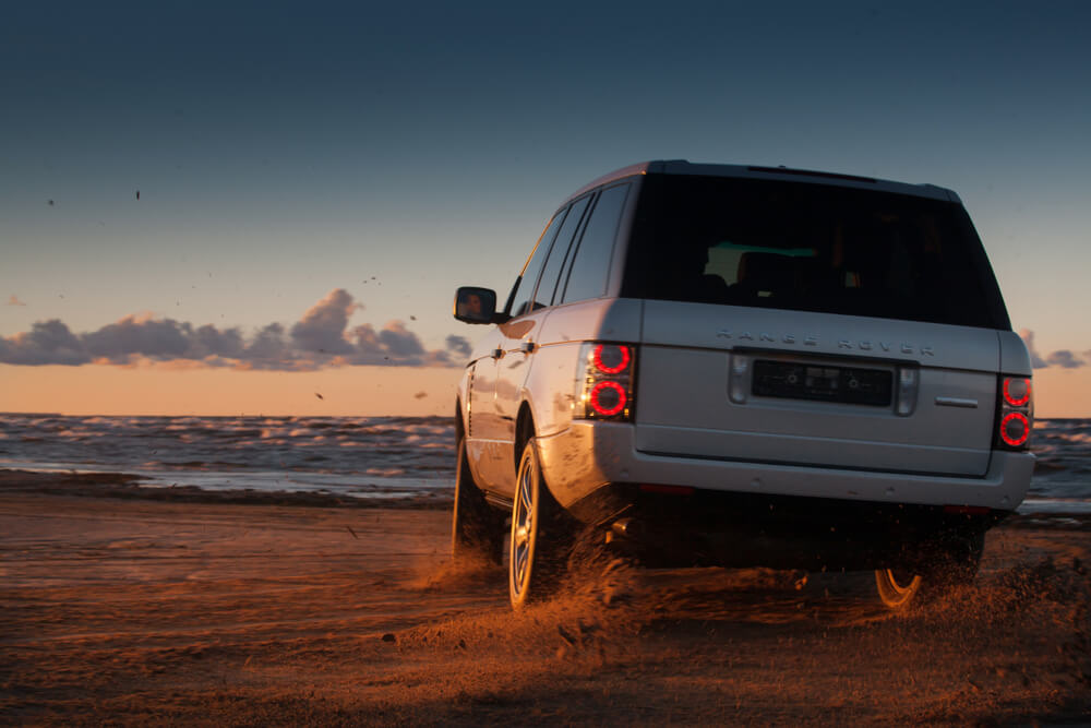 SUV On The Beach