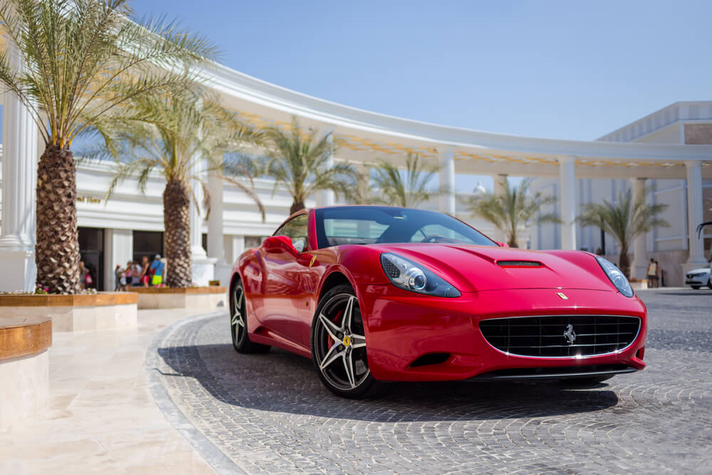 A red luxury Ferrari supercar. - luxury cars rear-wheel drives